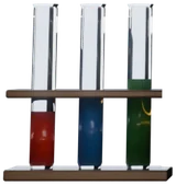 A rack of colored test tubes